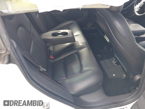 2019 Tesla Model 3 Mid Range with VIN 5YJ3E1EA6KF396946, listed as a IAAI auction lot 41123058 with 69,013 mi miles and . Bid and sale history available at carsss.com. Image 8.