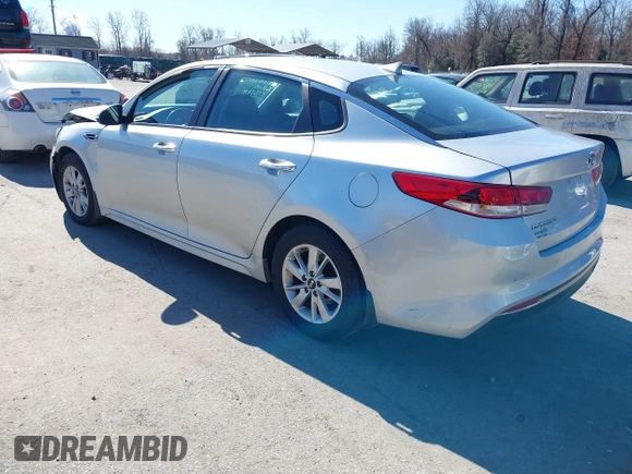 2016 Kia Optima LX with VIN 5XXGT4L37GG084538, listed as a IAAI auction lot 41784807 with 128,928 mi miles. Bid and sale history available at carsss.com. Image 3.