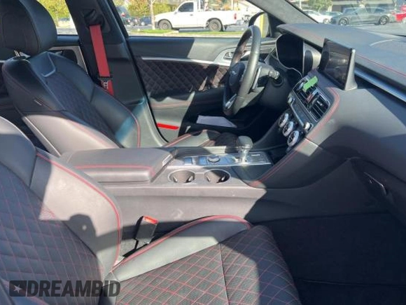 2023 Genesis G70 3.3T with VIN KMTG54TE6PU106021, listed as a Copart auction lot 86750284 with 8,669 mi miles and Salvage Title. Bid and sale history available at DreamBid. Image 5.