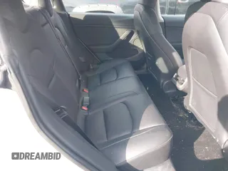 2023 Tesla Model 3 z VIN 5YJ3E1EAXPF543227, wystawiony jako IAAI lot #41150158 z przebiegiem 19 782 mil mil oraz . Historia ofert i sprzedaży dostępna na DreamBid. Obrazek 8.