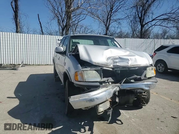 2003 Ford F-150 XLT with VIN 1FTRW08L03KD74119, listed as a Copart auction lot 47373105 with 303,513 mi miles and Salvage Title. Bid and sale history available at carsss.com. Image 10.