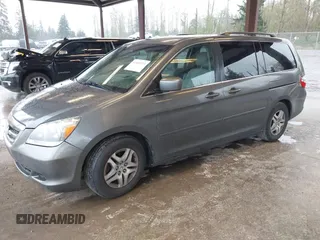 2007 Honda Odyssey EX with VIN 5FNRL38417B054717, listed as a IAAI auction lot 41955733 with 157,076 mi miles. Bid and sale history available at carsss.com. Image 2.