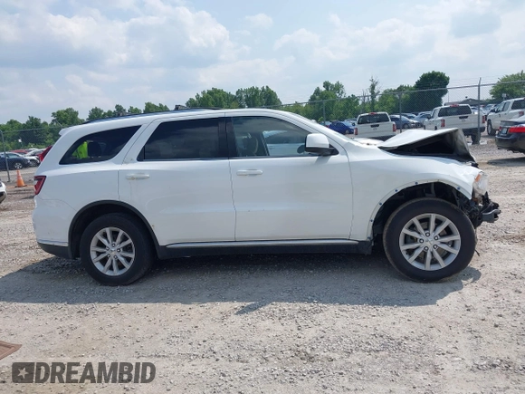 2014 Dodge Durango SXT with VIN 1C4RDHAG9EC313429, listed as a IAAI auction lot 42470331 with 182,635 mi miles and . Bid and sale history available at DreamBid. Image 14.
