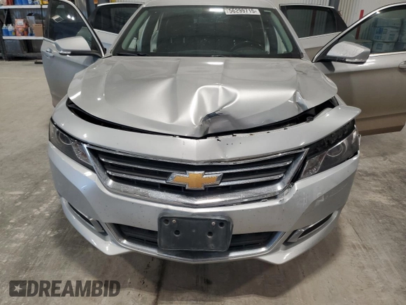 2014 Chevrolet Impala LT z VIN 2G1115SL8E9118955, wystawiony jako Copart lot #56299715 z przebiegiem 217 840 mil mil oraz Szkoda całkowita • Salvage title. Historia ofert i sprzedaży dostępna na DreamBid. Obrazek 11.
