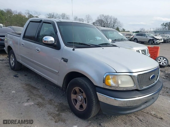 2001 Ford F-150 SuperCrew XLT with VIN 1FTRW07W41KE26988, listed as a IAAI auction lot 41656172 with NaN miles. Bid and sale history available at carsss.com. Image 1.