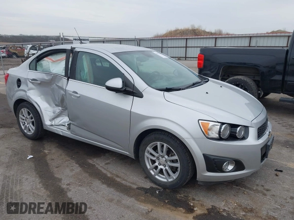2012 Chevrolet Sonic LT with VIN 1G1JC5SH0C4162034, listed as a IAAI auction lot 41967195 with 87,086 mi miles and . Bid and sale history available at DreamBid. Image 1.