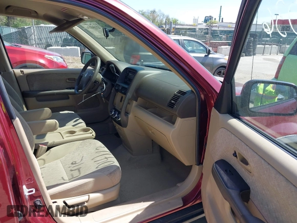 2006 Honda CR-V LX with VIN JHLRD68556C001167, listed as a IAAI auction lot 42104036 with 113,590 mi miles and . Bid and sale history available at DreamBid. Image 5.