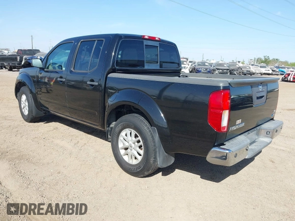 2017 Nissan Frontier SV with VIN 1N6DD0ER4HN770601, listed as a IAAI auction lot 41805944 with 67,765 mi miles and . Bid and sale history available at DreamBid. Image 3.
