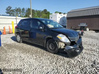 2009 Nissan Versa 1.8 SL with VIN 3N1BC13E59L500137, listed as a Copart auction lot 52339125 with 121,643 mi miles and Salvage Title. Bid and sale history available at carsss.com. Image 4.