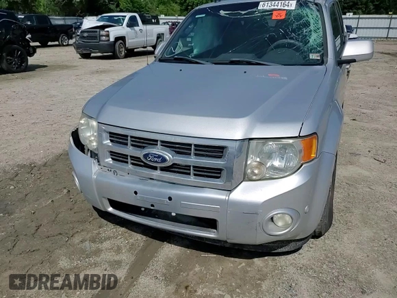 2010 Ford Escape Limited with VIN 1FMCU0E71AKC71285, listed as a Copart auction lot 61344164 with 163,471 mi miles and Salvage title. Bid and sale history available at DreamBid. Image 14.