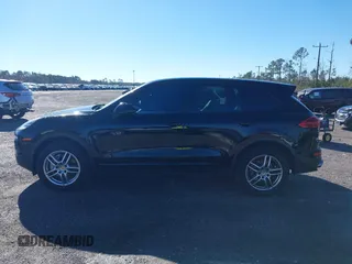 2016 Porsche Cayenne with VIN WP1AA2A21GLA02456, listed as a IAAI auction lot 41309026 with 136,266 mi miles. Bid and sale history available at carsss.com. Image 14.