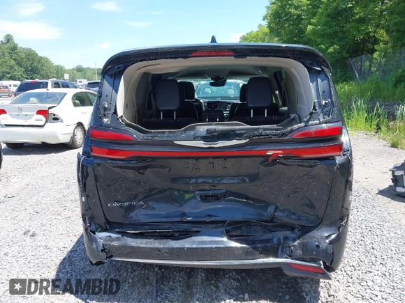 2023 Chrysler Pacifica Touring L with VIN 2C4RC1BG2PR534194, listed as a IAAI auction lot 42613934 with 69,896 mi miles and . Bid and sale history available at DreamBid. Image 16.