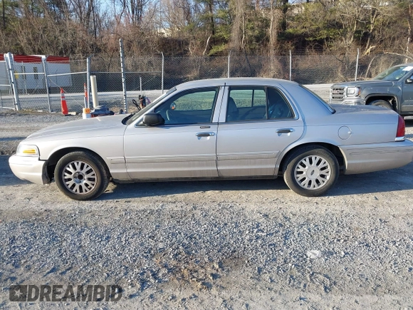 2005 Ford Crown Victoria LX z VIN 2FAFP74W85X121984, wystawiony jako IAAI lot #41427678 z przebiegiem 113 437 mil mil oraz . Historia ofert i sprzedaży dostępna na DreamBid. Obrazek 14.