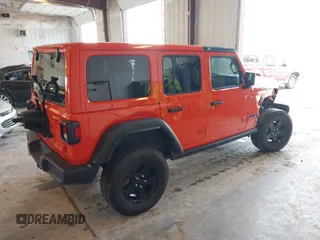2023 Jeep Wrangler Sport with VIN 1C4HJXDG7PW676453, listed as a IAAI auction lot 42222995 with 32,347 mi miles and . Bid and sale history available at DreamBid. Image 4.