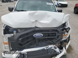 2021 Ford F-150 XL with VIN 1FTFX1E51MFC05216, listed as a Copart auction lot 56571785 with 94,584 mi miles and Salvage title. Bid and sale history available at DreamBid. Image 11.