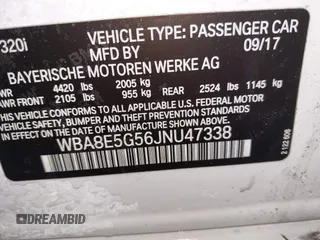 2018 BMW 3 Series 320i xDrive with VIN WBA8E5G56JNU47338, listed as a IAAI auction lot 41238204 with 54,596 mi miles. Bid and sale history available at carsss.com. Image 9.