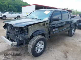 2015 Toyota Tacoma PreRunner with VIN 3TMJU4GN5FM189557, listed as a IAAI auction lot 42387542 with 189,188 mi miles and . Bid and sale history available at DreamBid. Image 2.
