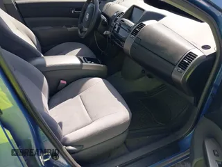 2007 Toyota Prius z VIN JTDKB20U177621010, wystawiony jako IAAI lot #42565535 z przebiegiem 205 692 mil mil oraz . Historia ofert i sprzedaży dostępna na DreamBid. Obrazek 5.
