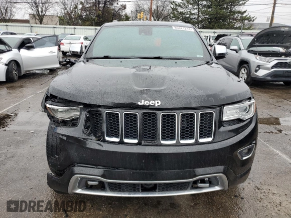 2015 Jeep Grand Cherokee Overland with VIN 1C4RJFCG7FC925995, listed as a Copart auction lot 85421214 with 142,266 mi miles and Salvage Title. Bid and sale history available at carsss.com. Image 5.