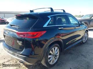 2019 Infiniti QX50 LUXE with VIN 3PCAJ5M35KF119556, listed as a IAAI auction lot 42012935 with 162,122 mi miles. Bid and sale history available at carsss.com. Image 4.
