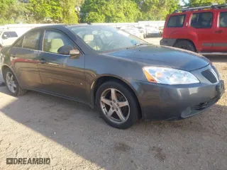 2006 Pontiac G6 GT with VIN 1G2ZH578164171631, listed as a IAAI auction lot 41945854 with 137,457 mi miles. Bid and sale history available at carsss.com. Image 1.