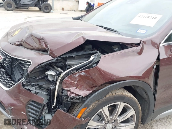 2022 Cadillac XT4 FWD Premium Luxury with VIN 1GYFZCR4XNF116845, listed as a IAAI auction lot 42128210 with 43,423 mi miles and . Bid and sale history available at DreamBid. Image 6.