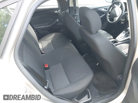 2017 Ford Focus SE with VIN 1FADP3F2XHL304752, listed as a IAAI auction lot 42492195 with 72,142 mi miles and . Bid and sale history available at DreamBid. Image 8.