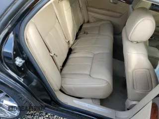2006 Cadillac DTS 1SD z VIN 1G6KD57Y16U140102, wystawiony jako Copart lot #46145435 z przebiegiem 95 567 mil mil oraz Szkody całkowita. Historia ofert i sprzedaży dostępna na DreamBid. Obrazek 10.
