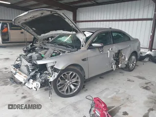 2014 Ford Taurus Limited с VIN 1FAHP2F89EG186147, выставлен на аукционе IAAI как лот 42228000 с пробегом 179 863 миль миль и . История ставок и продаж доступна на DreamBid. Изображение 2.