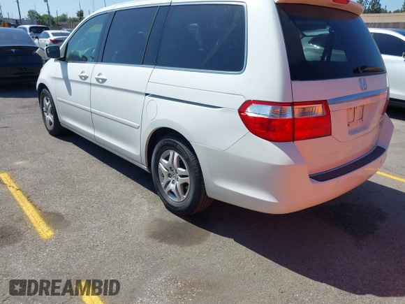 2005 Honda Odyssey TOURING with VIN 5FNRL38865B083615, listed as a IAAI auction lot 41993430 with 86,636 mi miles. Bid and sale history available at carsss.com. Image 3.