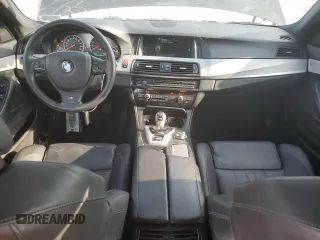 2014 BMW M5 z VIN WBSFV9C53ED594132, wystawiony jako Copart lot #56479355 z przebiegiem 89 020 mil mil oraz Szkody całkowita. Historia ofert i sprzedaży dostępna na DreamBid. Obrazek 8.