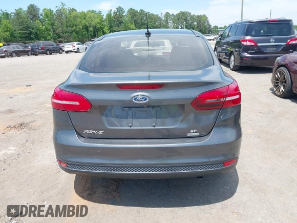 2018 Ford Focus SE with VIN 1FADP3FE2JL227679, listed as a IAAI auction lot 42296608 with 128,269 mi miles and . Bid and sale history available at DreamBid. Image 16.