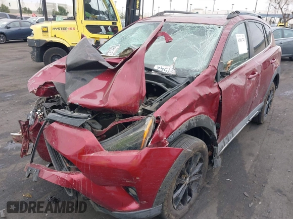 2018 Toyota RAV4 XLE with VIN 2T3RFREVXJW699293, listed as a IAAI auction lot 41881742 with Not Provided miles and . Bid and sale history available at DreamBid. Image 6.
