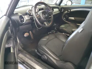 2012 MINI Convertible S с VIN WMWZP3C55CT249664, выставлен на аукционе Copart как лот 63120145 с пробегом 59 197 миль миль и Списание • Salvage title. История ставок и продаж доступна на DreamBid. Изображение 8.