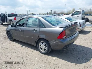 2004 Ford Focus SE with VIN 1FAFP34334W177338, listed as a IAAI auction lot 42003202 with 190,581 mi miles and . Bid and sale history available at DreamBid. Image 3.