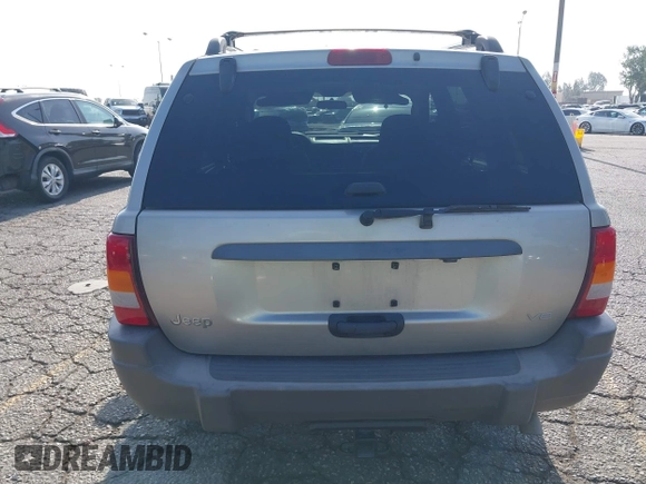 2004 Jeep Grand Cherokee Laredo with VIN 1J4GX48N24C334983, listed as a IAAI auction lot 42522088 with 169,793 mi miles and . Bid and sale history available at DreamBid. Image 16.
