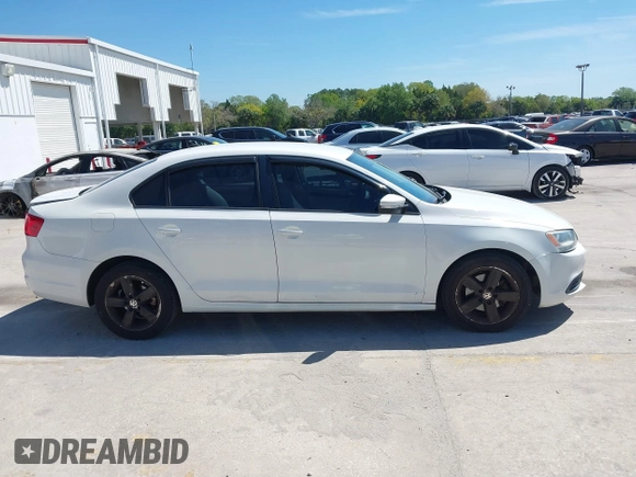 2012 Volkswagen Jetta Sedan SE w/Convenience with VIN 3VWDX7AJ3CM392032, listed as a IAAI auction lot 41825344 with 177,581 mi miles. Bid and sale history available at carsss.com. Image 13.