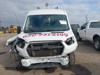 2022 Ford Transit Cargo with VIN 1FTBR1C80NKA05202, listed as a IAAI auction lot 41447583 with 75,302 mi miles and . Bid and sale history available at DreamBid. Image 13.