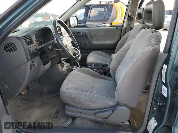 1999 Isuzu Rodeo S with VIN 4S2CK58W0X4378100, listed as a Copart auction lot 78462184 with Not provided miles and Salvage title. Bid and sale history available at DreamBid. Image 7.