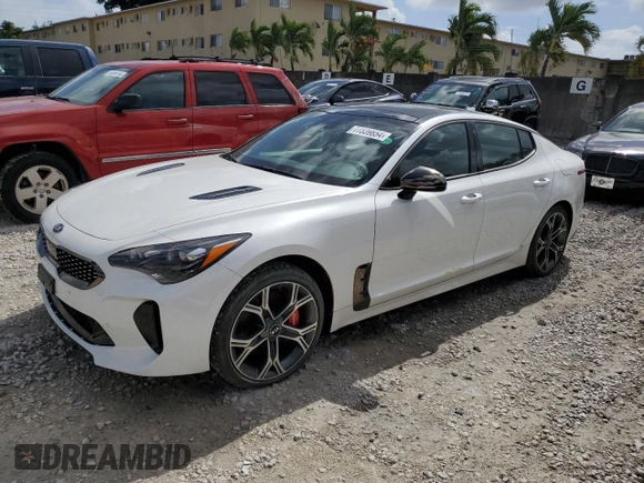 2021 Kia Stinger GT1 with VIN KNAE45LC9M6090262, listed as a Copart auction lot 77339854 with 3,354 mi miles and Salvage Title. Bid and sale history available at carsss.com. Image 1.