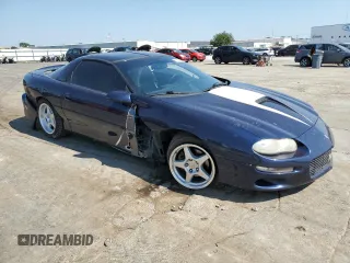2000 Chevrolet Camaro Z28 z VIN 2G1FP22G9Y2162742, wystawiony jako Copart lot #62568574 z przebiegiem 87 834 mil mil oraz Szkoda całkowita • Salvage title. Historia ofert i sprzedaży dostępna na DreamBid. Obrazek 4.