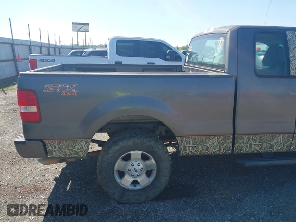 2007 Ford F-150 STX with VIN 1FTRX14W47FA54576, listed as a IAAI auction lot 41971521 with 220,945 mi miles. Bid and sale history available at carsss.com. Image 15.