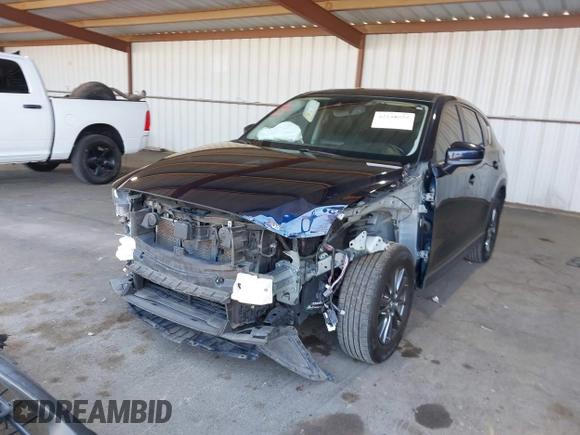 2020 Mazda CX-5 Touring z VIN JM3KFACM2L0802461, wystawiony jako IAAI lot #42148039 z przebiegiem 57 963 mil mil oraz . Historia ofert i sprzedaży dostępna na DreamBid. Obrazek 6.