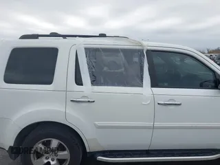 2011 Honda Pilot EX-L with VIN 5FNYF3H67BB014641, listed as a IAAI auction lot 41276698 with 193,656 mi miles and . Bid and sale history available at DreamBid. Image 6.