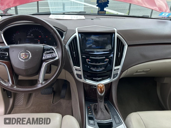 2015 Cadillac SRX Luxury Collection z VIN 3GYFNBE37FS569840, wystawiony jako Copart lot #52823025 z przebiegiem 183 816 mil mil oraz Czysty tytuł • Clean title. Historia ofert i sprzedaży dostępna na DreamBid. Obrazek 9.