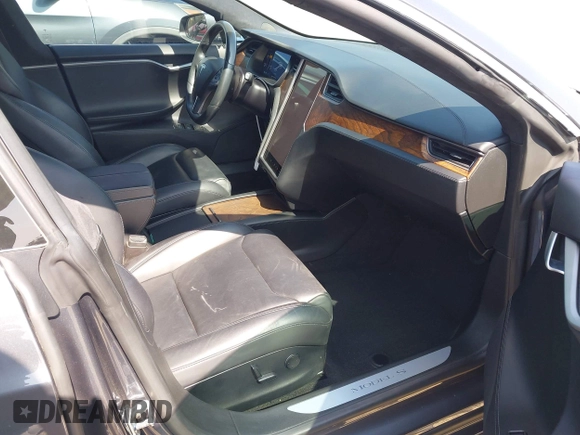 2019 Tesla Model S 75D with VIN 5YJSA1E25KF304371, listed as a IAAI auction lot 42349856 with 64,788 mi miles and . Bid and sale history available at DreamBid. Image 5.
