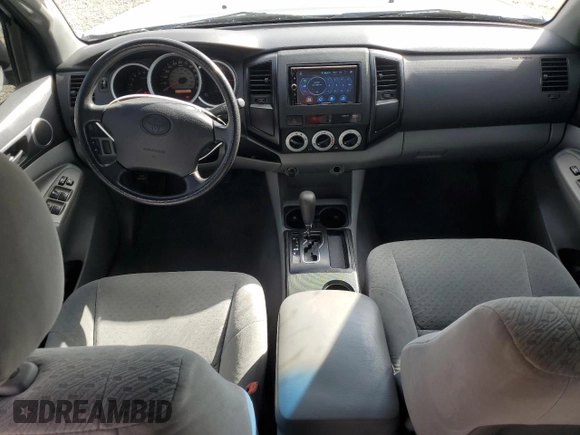 2008 Toyota Tacoma PreRunner with VIN 3TMKU72N28M017714, listed as a Copart auction lot 56787395 with 209,832 mi miles and Salvage title. Bid and sale history available at DreamBid. Image 8.