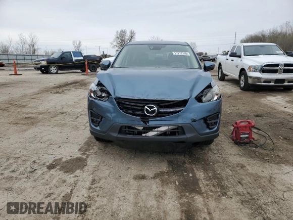 2016 Mazda CX-5 Grand Touring with VIN JM3KE2DY0G0748190, listed as a Copart auction lot 51913155 with 107,997 mi miles and Salvage Title. Bid and sale history available at carsss.com. Image 5.