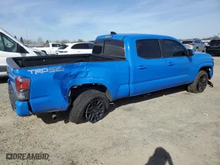 2021 Toyota Tacoma 4WD SR5 with VIN 3TMDZ5BN6MM112690, listed as a Copart auction lot 47038895 with 99,860 mi miles and Salvage Title. Bid and sale history available at carsss.com. Image 3.