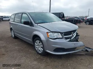 2015 Dodge Grand Caravan American Value Pkg with VIN 2C4RDGBG0FR608291, listed as a IAAI auction lot 41533719 with 166,214 mi miles. Bid and sale history available at carsss.com. Image 1.